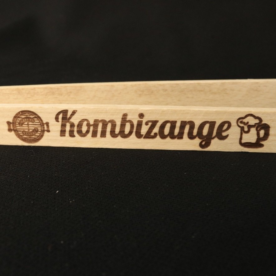 gebrannter Druck mit der Aufschrift Kombizange