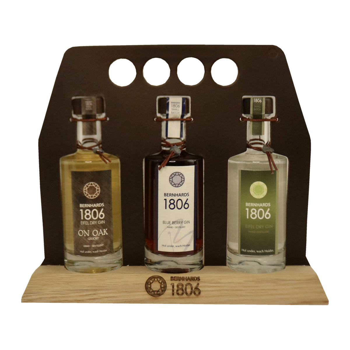 Bernhards 1806 Gin-Geschenkset im Träger mit Holzfuß: On Oak, Blueberry und Eifel Dry Gin, je 0,1 l