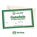 Gedruckter Lecker-Eifel Gutschein mit grünem Rahmen und cremefarbenem Umschlag, gekennzeichnet mit „Per Post“