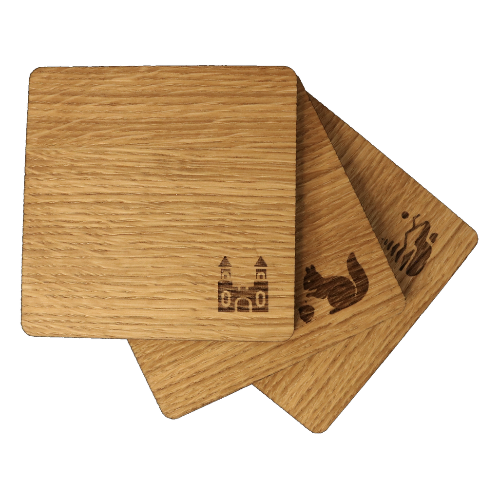 Drei Holzuntersetzer mit Eifel-Motiven: Abtei, Eichhörnchen und Wanderer